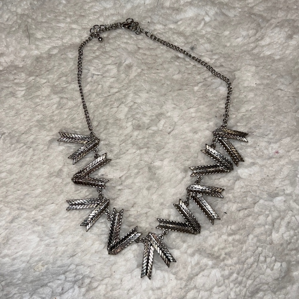 Silver cosmetic necklace